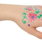 A hand with flowers drawn on top