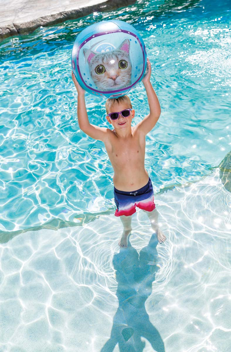 Boy holding Beach Ball Space Cat