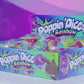 A video showing rainbow poppin' dice in packaging and in use